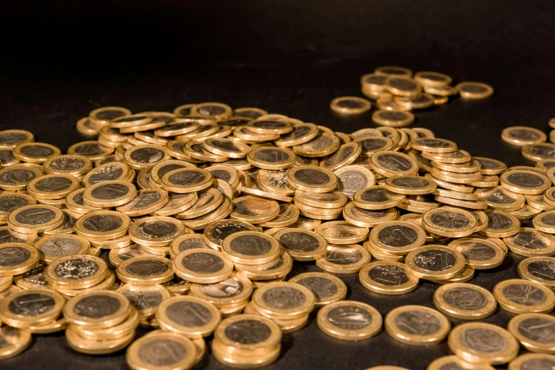 a pile of gold coins sitting on top of a table, by Daniel Lieske, pexels contest winner, black and gold, 10k, 3 4 5 3 1, portrait photo