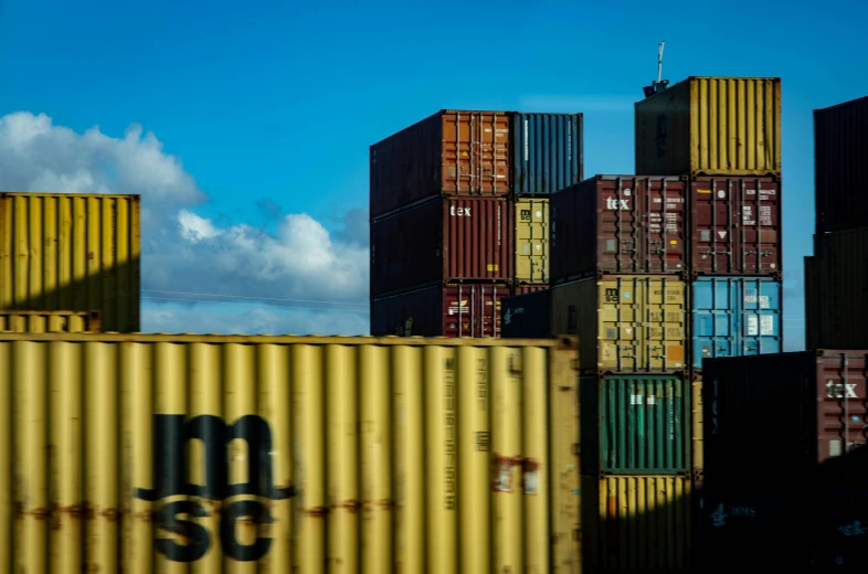 a bunch of containers stacked on top of each other, a portrait, unsplash, new zealand, portrait image