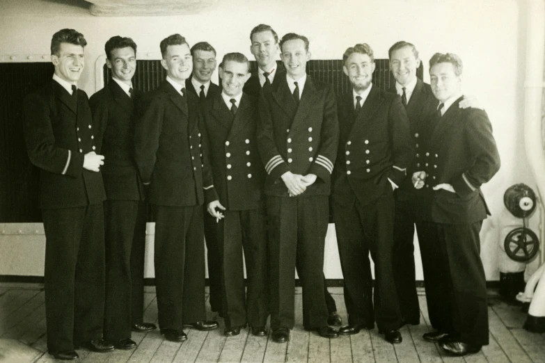 a group of men standing next to each other, maritime, dapper, ww 2, no crop