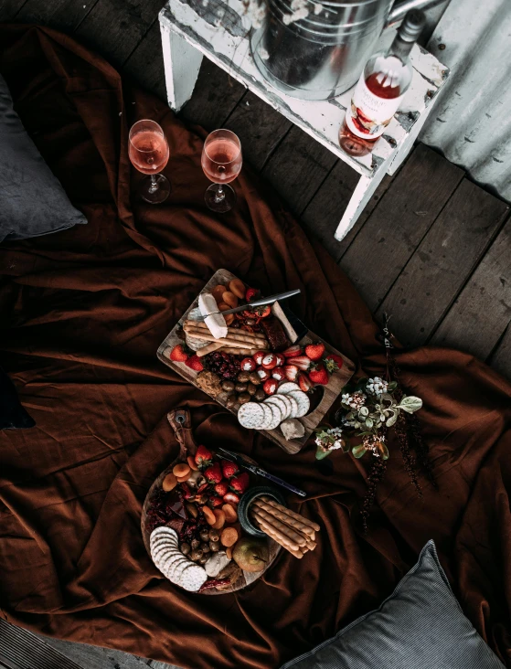 a table that has a bunch of food on it, unsplash contest winner, romanticism, brown clothes, candy treatments, wine, 15081959 21121991 01012000 4k