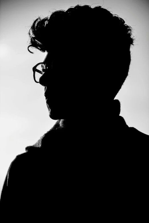 a black and white photo of a man with glasses, a black and white photo, pexels, conceptual art, silhouette :7, \'emulador\', profile picture 1024px, sun-hyuk kim