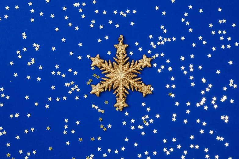 a snowflake surrounded by stars on a blue background, by Julia Pishtar, 24k, joe webb, fan favorite, hi - res