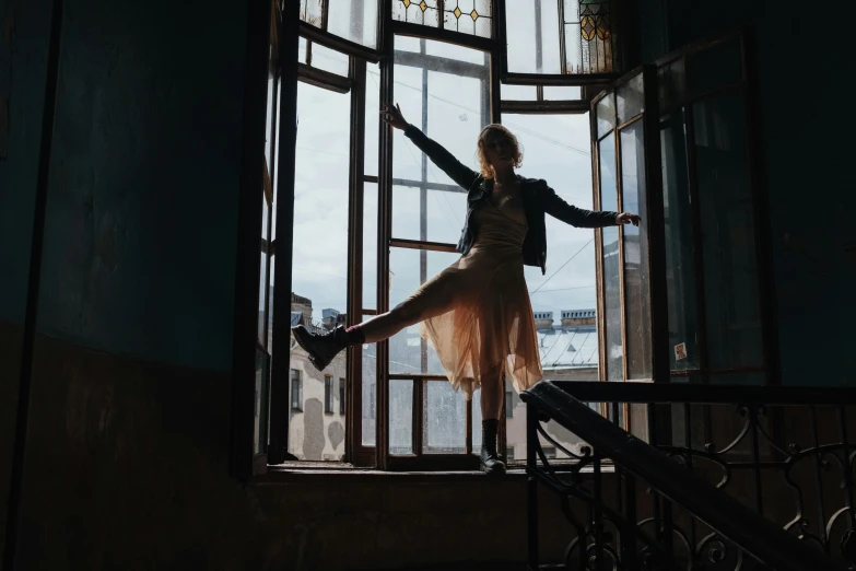 a woman that is standing in front of a window, inspired by Anka Zhuravleva, pexels contest winner, arabesque, fun pose, standing on two feet, post grunge, having a good time