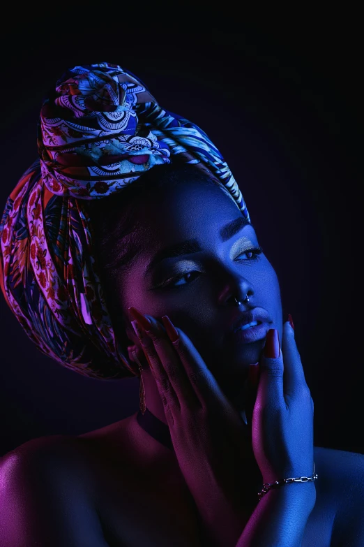 a woman with a turban on her head, an album cover, inspired by Makoto Aida, pexels contest winner, afrofuturism, sensual lighting, black light, modeling photography, vibrant scene