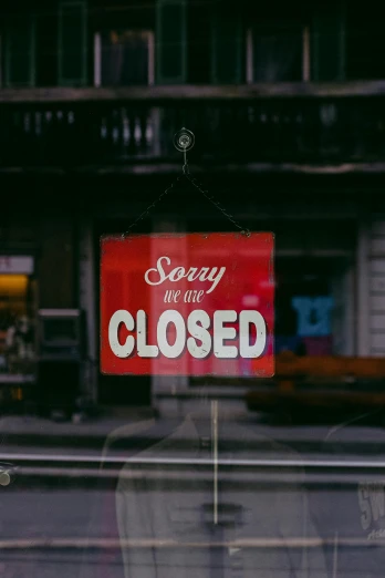 a closed sign in the window of a store, pexels, happening, broken vending machines, thumbnail, red flags holiday, dark bg