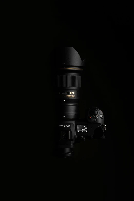 a camera that is sitting in the dark, a picture, by Daniel Seghers, nikon lens, voge photo, photograph ”, dramatic lighting - n 9