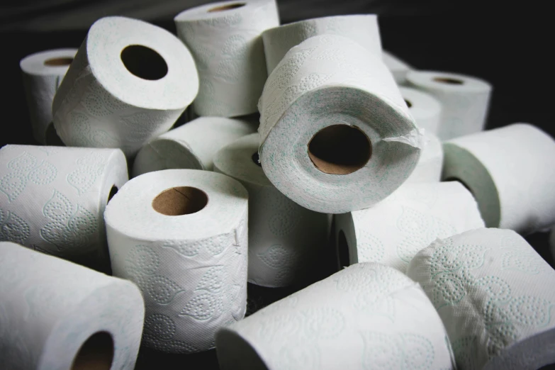 a pile of rolls of toilet paper sitting on top of each other, inspired by Sarah Lucas, unsplash, plasticien, chewing tobacco, paul barson, islamic, “diamonds