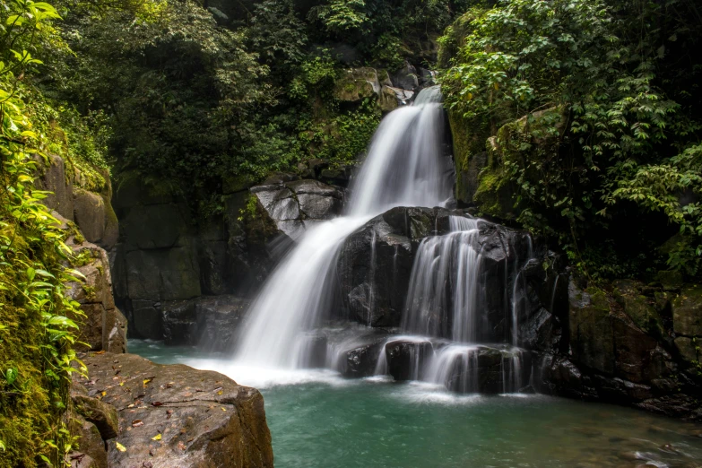 a waterfall in the middle of a lush green forest, pexels contest winner, sumatraism, city of armenia quindio, thumbnail, slide show, green waters