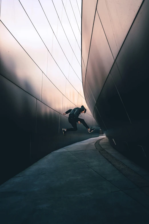 a man riding a skateboard up the side of a building, unsplash contest winner, hypermodernism, sprinting, in the early morning, photograph of a techwear woman, 5k