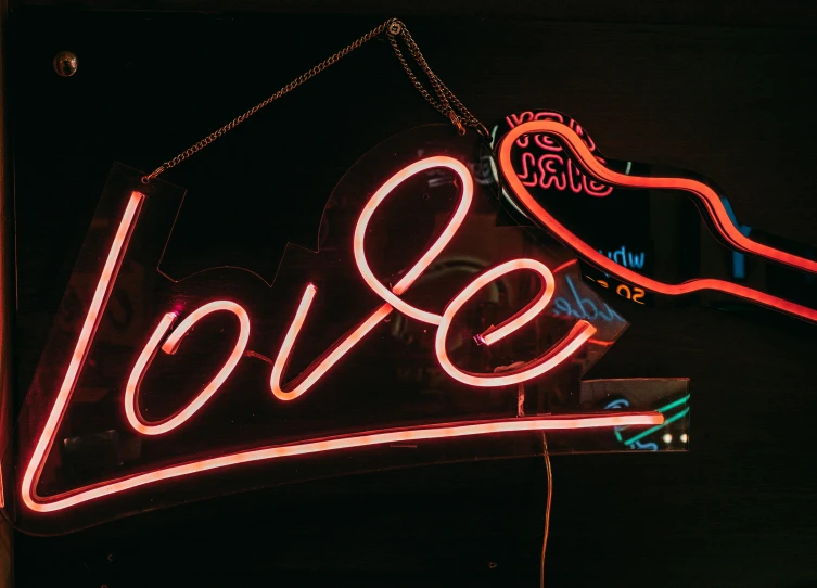 a neon sign with the word love on it, an album cover, by Joe Bowler, pexels, islamic, neon standup bar, lightweight, set photo