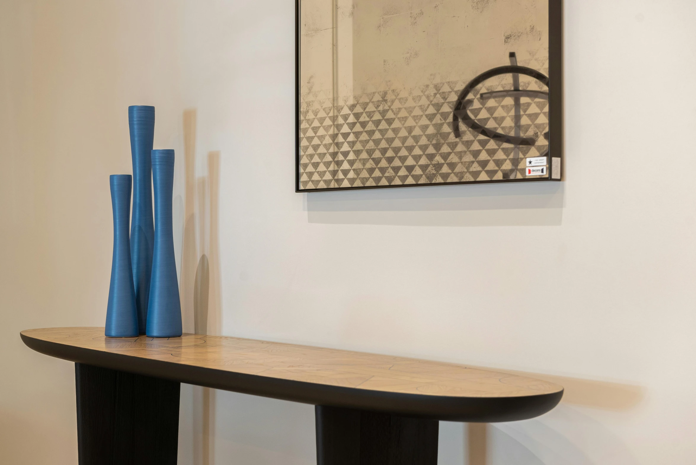a wooden table with two blue vases on it, an abstract sculpture, visual art, gallery display photograph, ad image, sleek curves, o'neill cylinder