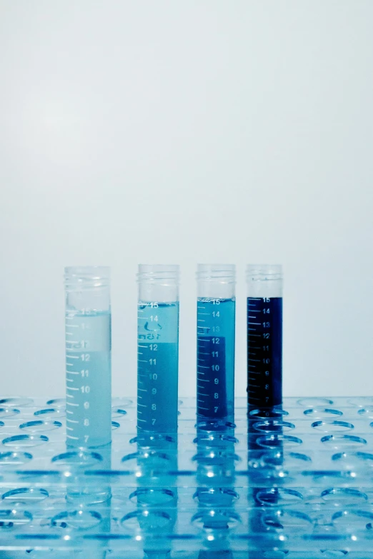 a row of test tubes filled with blue liquid, by Konrad Witz, 4 0 0 0 samples, high clarity, male, blue mist