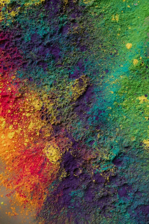 a close up of a rainbow colored substance, inspired by Attila Meszlenyi, lunar soil, satelite imagery, deep pyro colors, rainbow coloured rockets