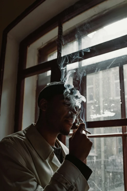 a man smoking a cigarette in front of a window, unsplash, harlem renaissance, smoking a bowl of hash together, low fi