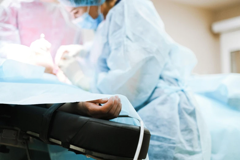 a close up of a person in a hospital bed, surgery theatre, fertile, thumbnail, brown