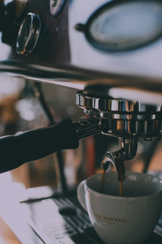 a coffee maker is making a cup of coffee, pexels contest winner, aussie baristas, dynamic closeup, thumbnail, multiple stories