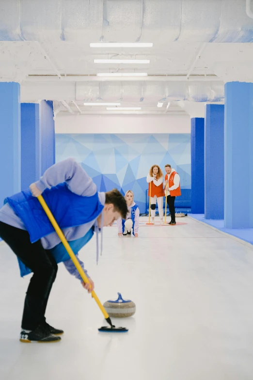 a man about to throw a curling stone, by Julia Pishtar, interactive art, clean spot color, courtesy of moma, blippi, kobalt blue