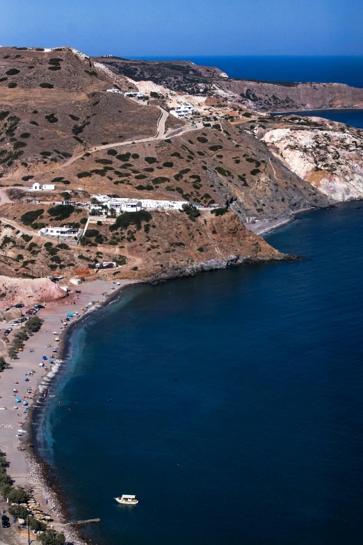 a large body of water next to a beach, renaissance, santorini, bird\'s eye view, slide show, road trip