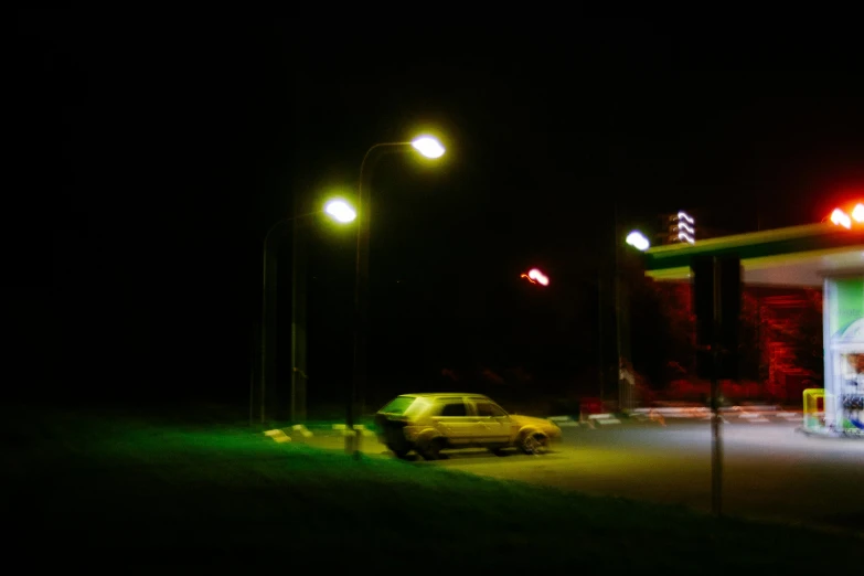 a car parked in front of a gas station at night, a picture, by Thomas Häfner, square, shot on a 2 0 0 3 camera, a green, landscape photo