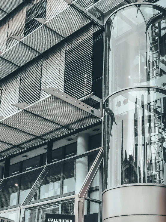 a black and white photo of a tall building, pexels contest winner, painted metal and glass, tall entry, thumbnail, ( mechanical )