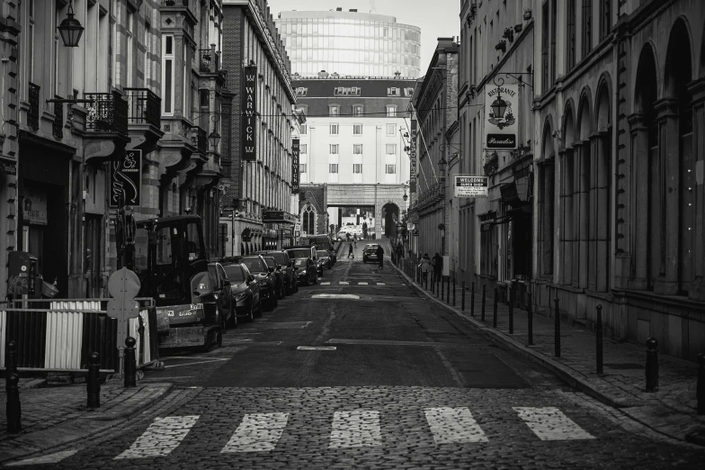 a black and white photo of a city street, inspired by Thomas Struth, pexels contest winner, renaissance, square, warsaw, late morning, high quality upload