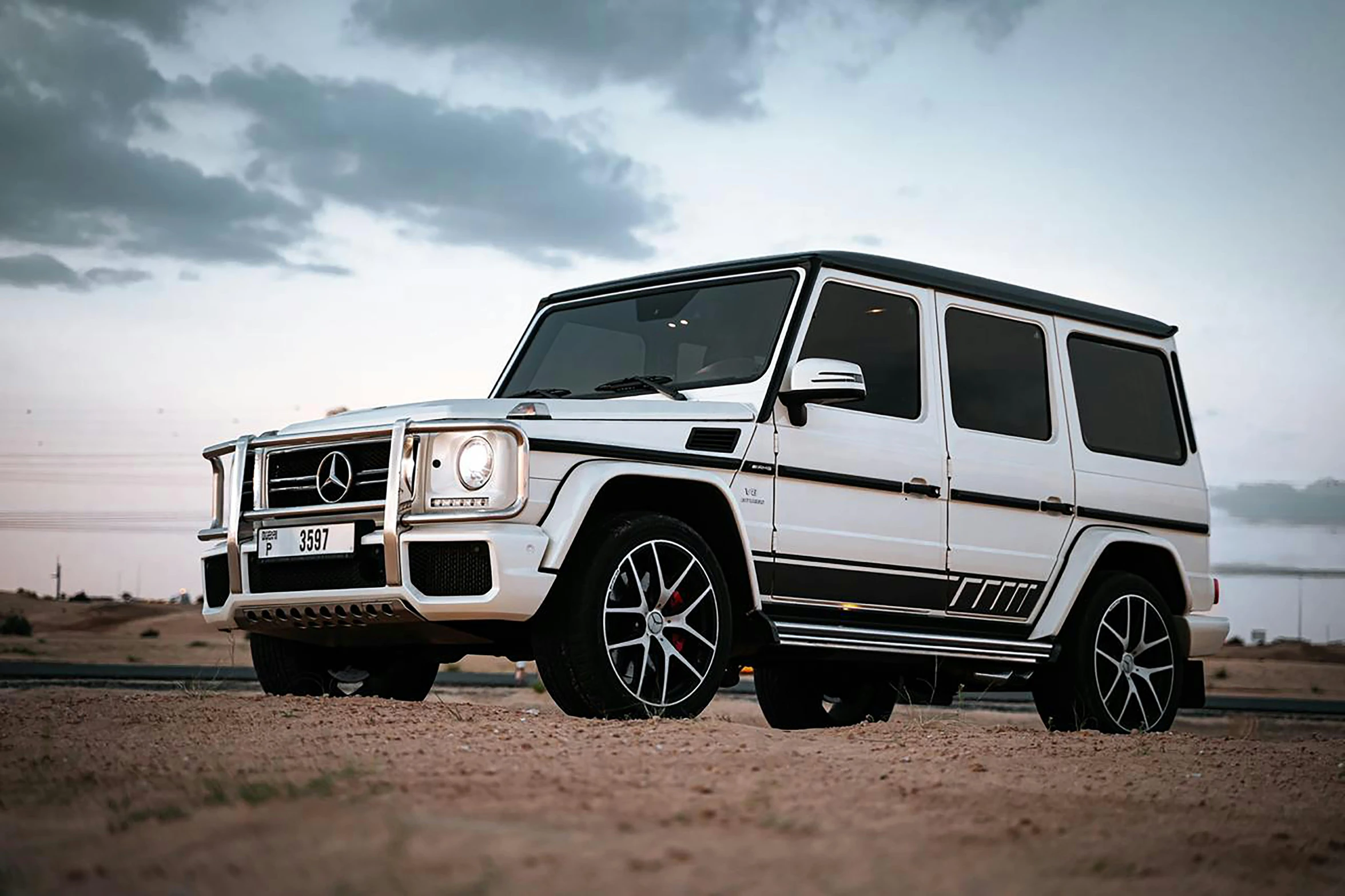 a white mercedes benz benz benz benz benz benz benz benz benz benz benz benz benz benz benz, a portrait, unsplash, off-roading, shot on sony a 7, hyperreal highly detailed 8 k, moab