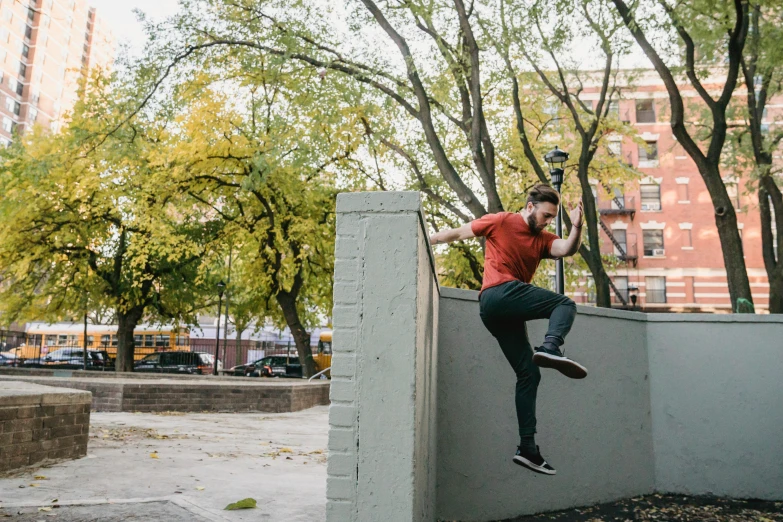 a man flying through the air while riding a skateboard, pexels contest winner, graffiti, cinder blocks, athletic crossfit build, parks, background image