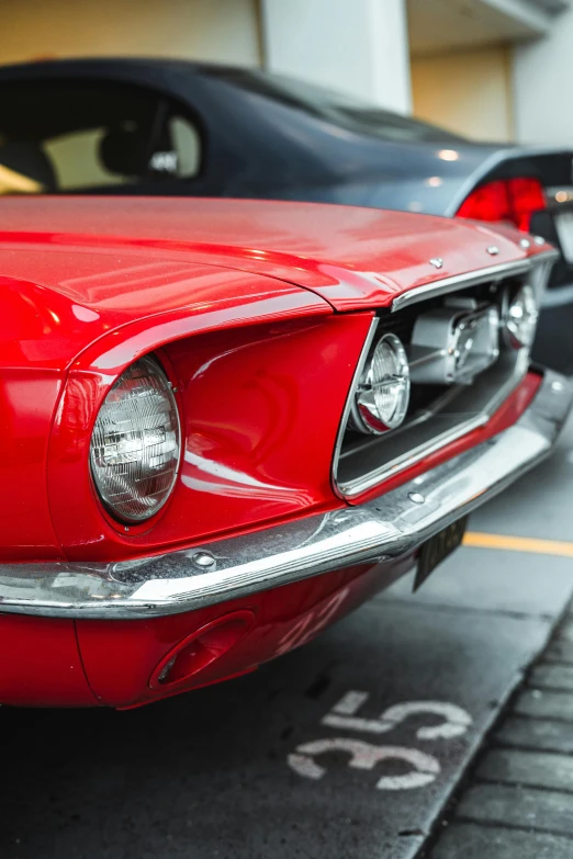 a red mustang parked in a parking lot, pexels contest winner, headlight washer, dynamic closeup, late 1 9 6 0's, instagram post