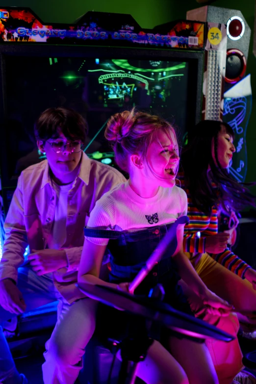 a group of people playing a video game, neon jungle, speed racer, iu, in a spaceship