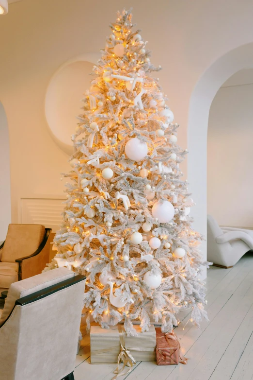 a white christmas tree in a living room, arabesque, near the beach, front facing, platinum, cast