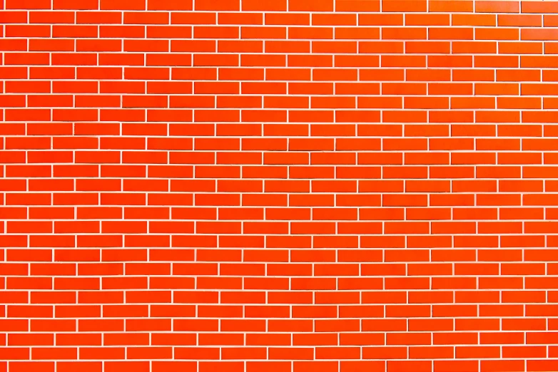 a fire hydrant in front of a brick wall, a digital rendering, by Andrei Kolkoutine, minimalism, roofing tiles texture, vibrant orange, brick wall background, pattern