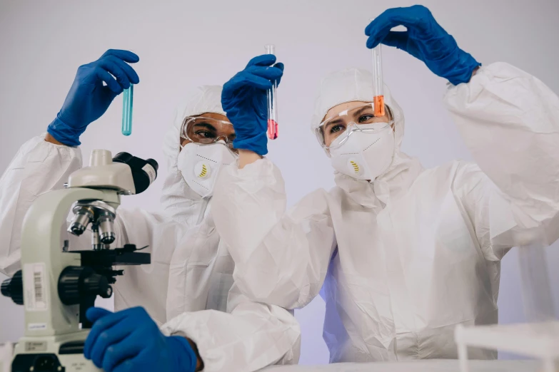 a couple of people that are standing in front of a microscope, hazmat suits, gen z, pathology sample test tubes, thumbnail