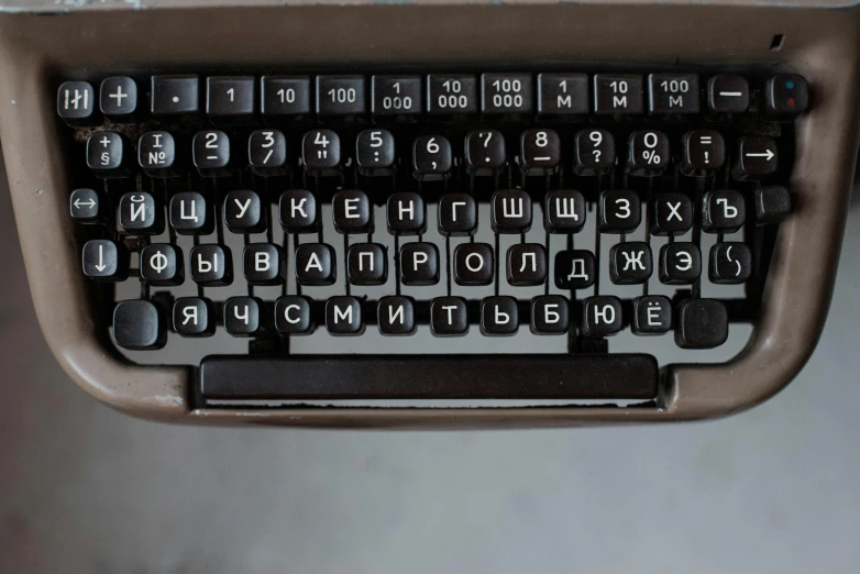 a close up of an old typewriter keyboard, by Emma Andijewska, unsplash, private press, soviet union, background image, museum photo, thumbnail