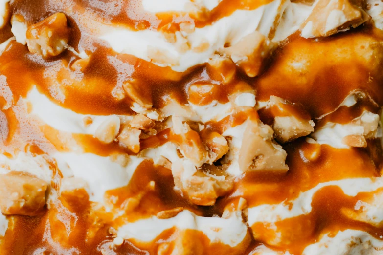 a close up of a plate of food on a table, caramel, detailed product image, up close image, ice cream