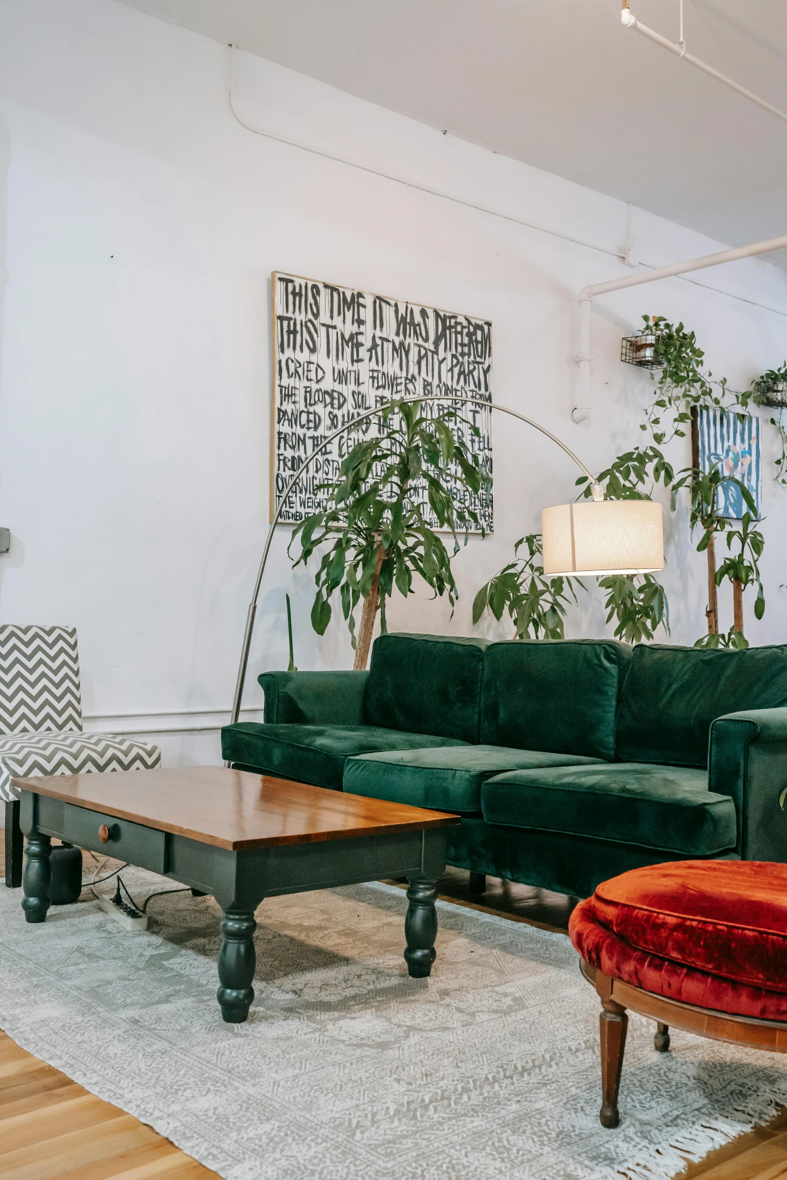 a living room filled with lots of green furniture, by Gavin Hamilton, trending on unsplash, lush brooklyn urban landscaping, interior white wall, small hipster coffee shop, inside a grand studio