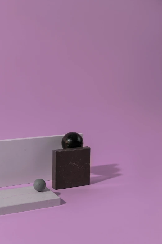 a white bench sitting on top of a pink floor, an abstract sculpture, inspired by Harvey Quaytman, unsplash, flying black marble balls, purple and black color palate, miniature product photo, behance lemanoosh