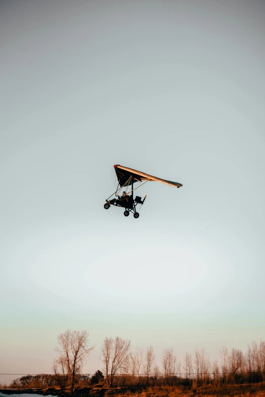 a small airplane that is flying in the sky, a picture, pexels contest winner, buggy, plain background, albuquerque, 15081959 21121991 01012000 4k