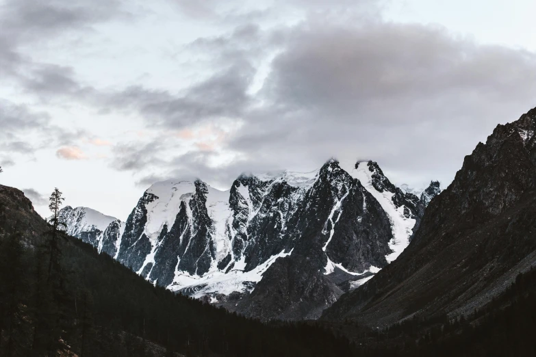 a body of water surrounded by mountains under a cloudy sky, pexels contest winner, baroque, icy mountains, photo of genghis khan, unsplash 4k, multiple stories