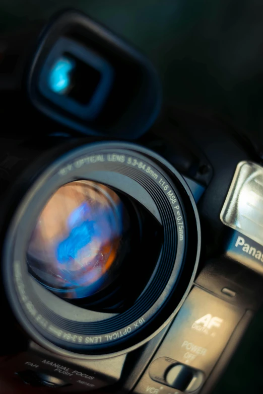 a close up of a person holding a camera, by Randall Schmit, full frame image, cinematic image, pov camera looking into the maw, today\'s featured photograph 4k