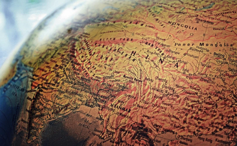 a close up of a map of the world, an album cover, pexels, cloisonnism, cinematic silk road lanscape, round-cropped, baotou china, thumbnail