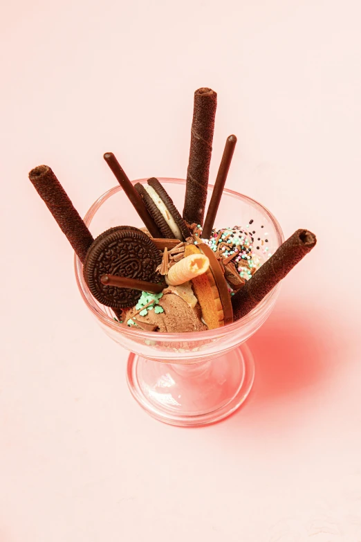 an ice cream sundae with cookies and sprinkles, inspired by William Harnett, trending on pexels, renaissance, lo fi, made of candy, stems, cosmopolitan