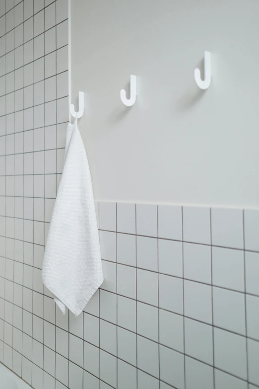 a bath room with a toilet a sink and a bath tub, a picture, inspired by Cerith Wyn Evans, unsplash, minimalism, wearing a towel, detail shot, white apron, square