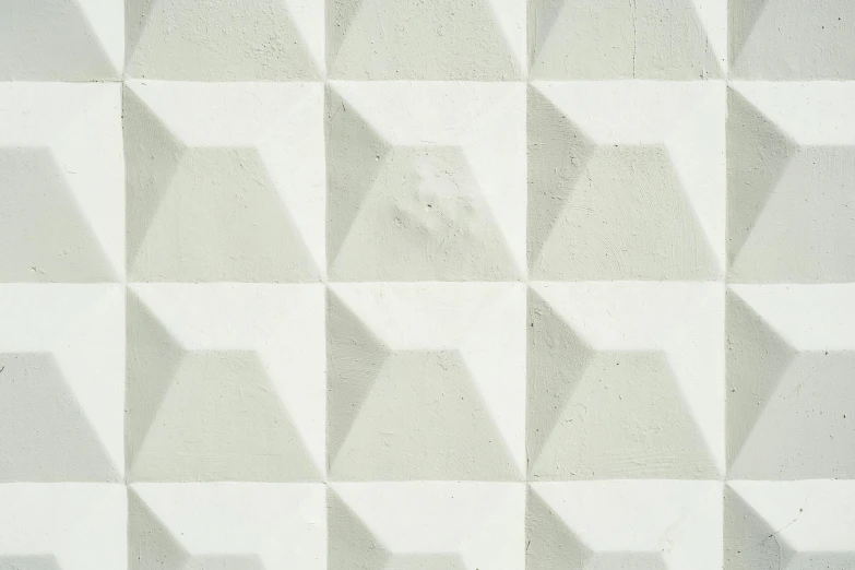 a close up of a wall with a pattern on it, a marble sculpture, inspired by Rachel Whiteread, deviantart, concrete art, pyramid background, white paint, detailed product image, tileable