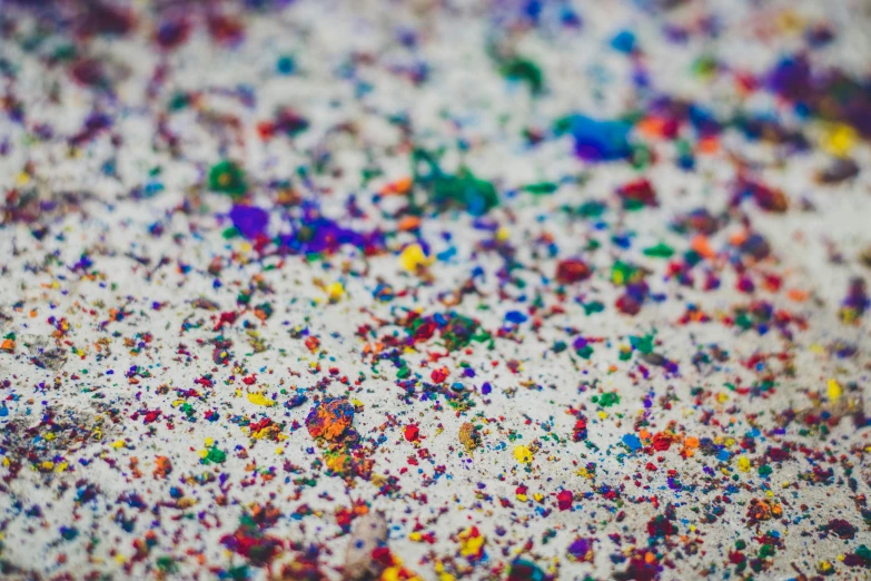 colorful sprinkles are scattered on a white surface, a pointillism painting, pexels, action painting, sam gilliam, ancient fairy dust, 1 0 2 4 farben abstract, abstract claymation