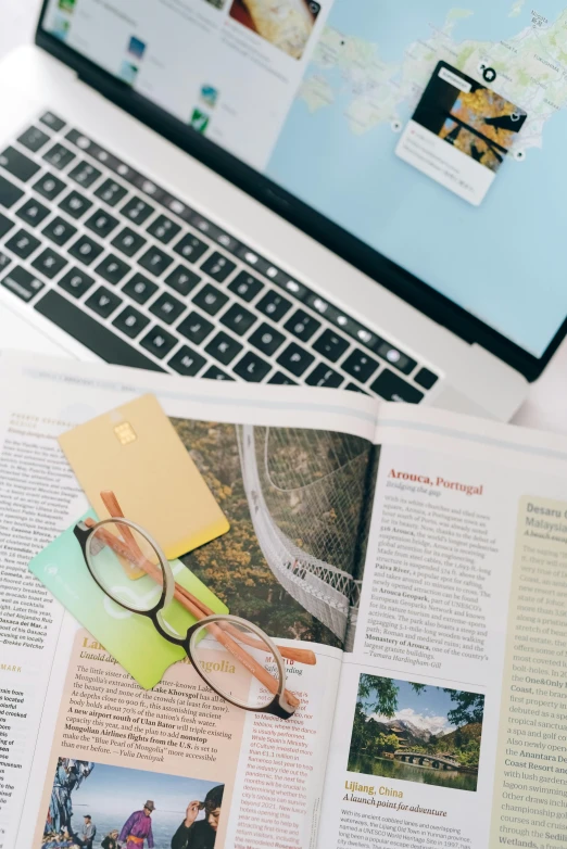 a laptop computer sitting on top of a desk, a picture, trending on pexels, colourful magazine collage, high angle close up shot, open book page, thumbnail