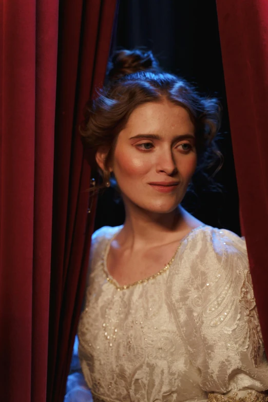 a woman in a white dress behind a red curtain, a portrait, inspired by Ivan Kramskoi, production photo, ad image, multiple stories, delightful