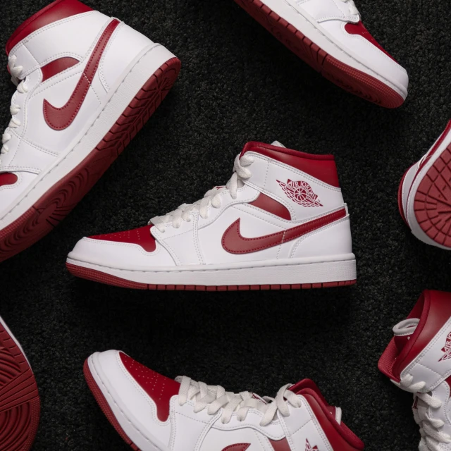 a group of red and white sneakers on a black surface, air jordan 1 high, maroon accents, pointè pose, high arches