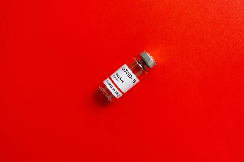a bottle of blood on a red surface, by Gavin Hamilton, pexels contest winner, medical labels, ( ( bauhaus ) ), mdma, yotobi