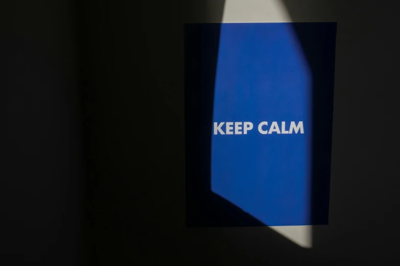 a poster with the words keep calm on it, inspired by Yves Klein, unsplash, hyperrealism, back light, cold blue light from the window, high quality photo, global illumination