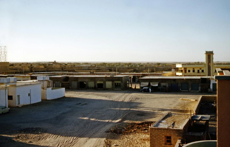 there is no image here to provide a caption for, flickr, les nabis, empty buildings with vegetation, overlooking a desolate wasteland, 2000s photo, construction yard